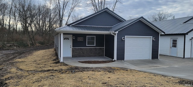 view of front of home with a garage