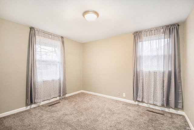 view of carpeted spare room