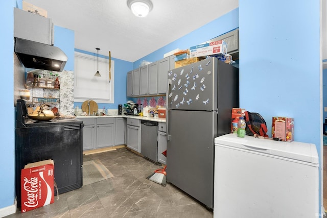 kitchen featuring gray cabinetry, stainless steel appliances, sink, exhaust hood, and hanging light fixtures