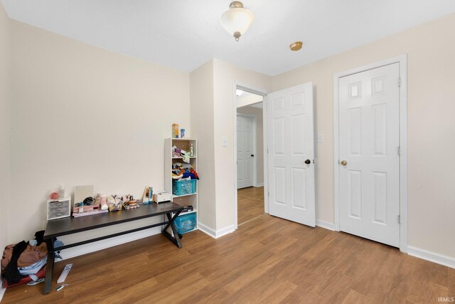 miscellaneous room with hardwood / wood-style flooring