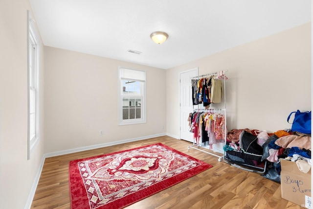 bedroom featuring a closet and hardwood / wood-style flooring