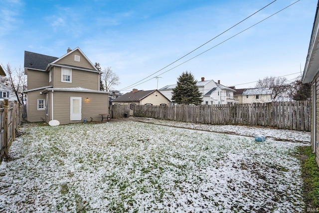 view of yard covered in snow