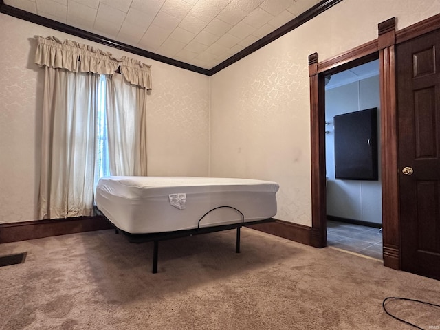 miscellaneous room with carpet floors and crown molding