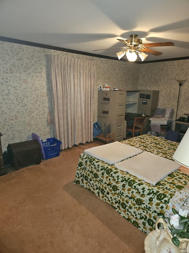 bedroom featuring carpet flooring, ceiling fan, and ornamental molding