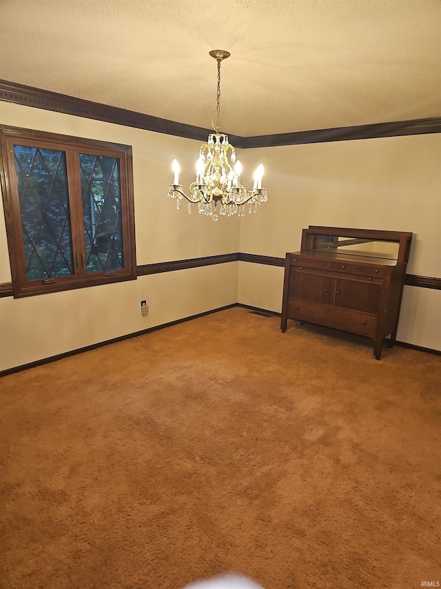 unfurnished dining area featuring carpet floors, an inviting chandelier, and ornamental molding