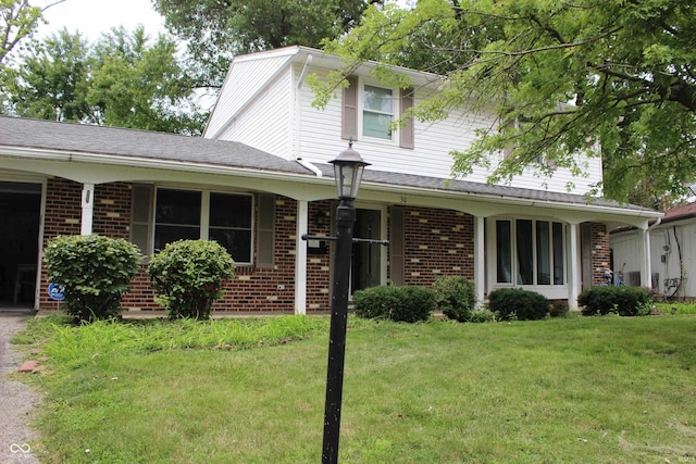 view of front of property with a front lawn