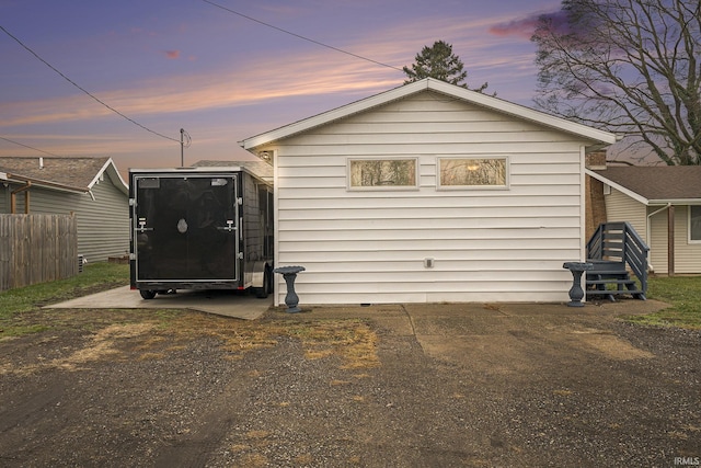 view of property exterior at dusk