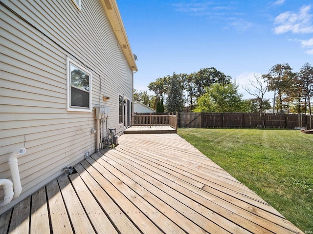 deck featuring a yard