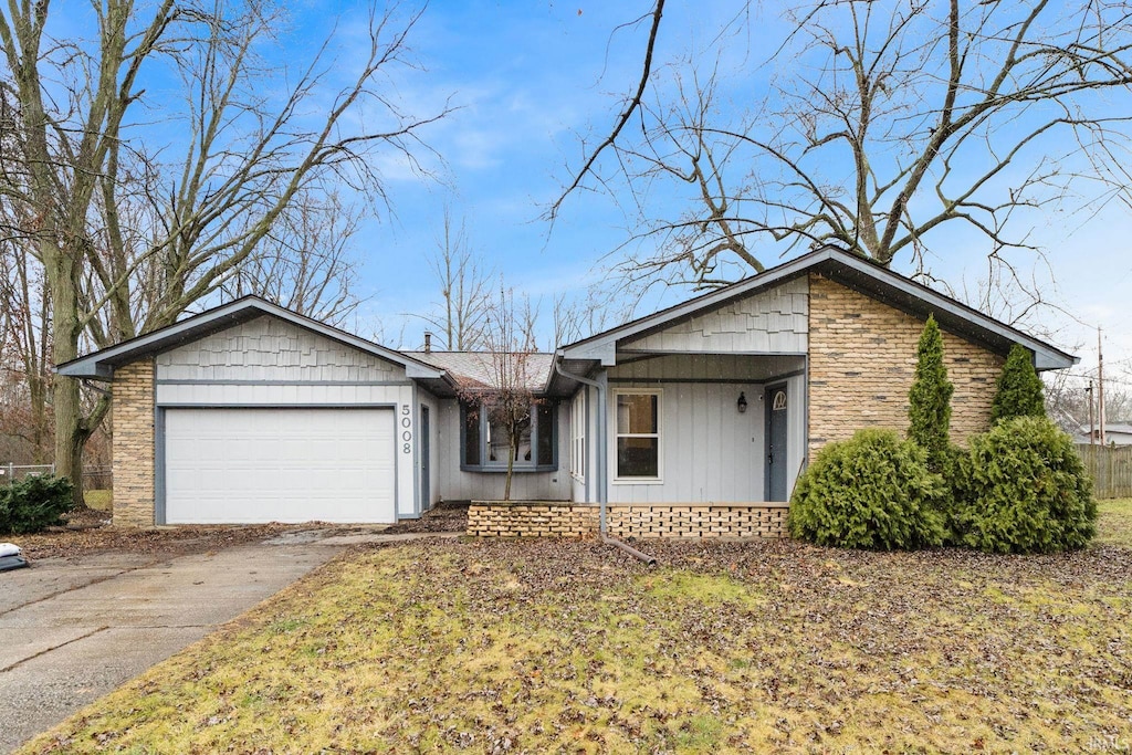 single story home featuring a garage