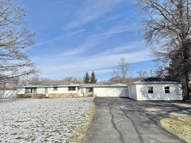 single story home featuring a garage