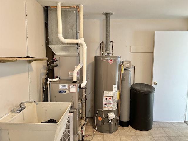 utility room featuring sink and water heater