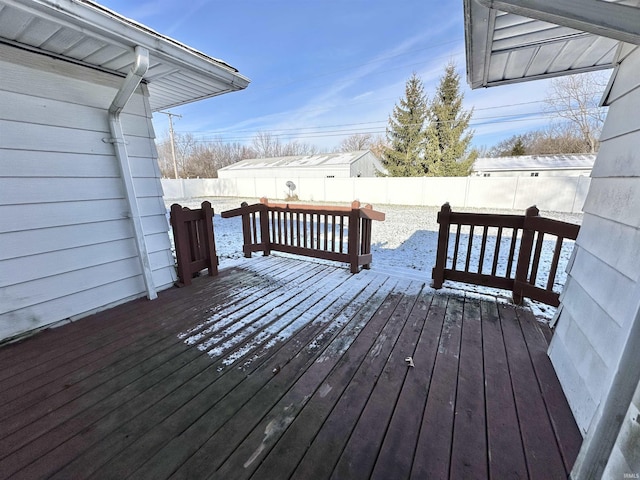 view of snow covered deck