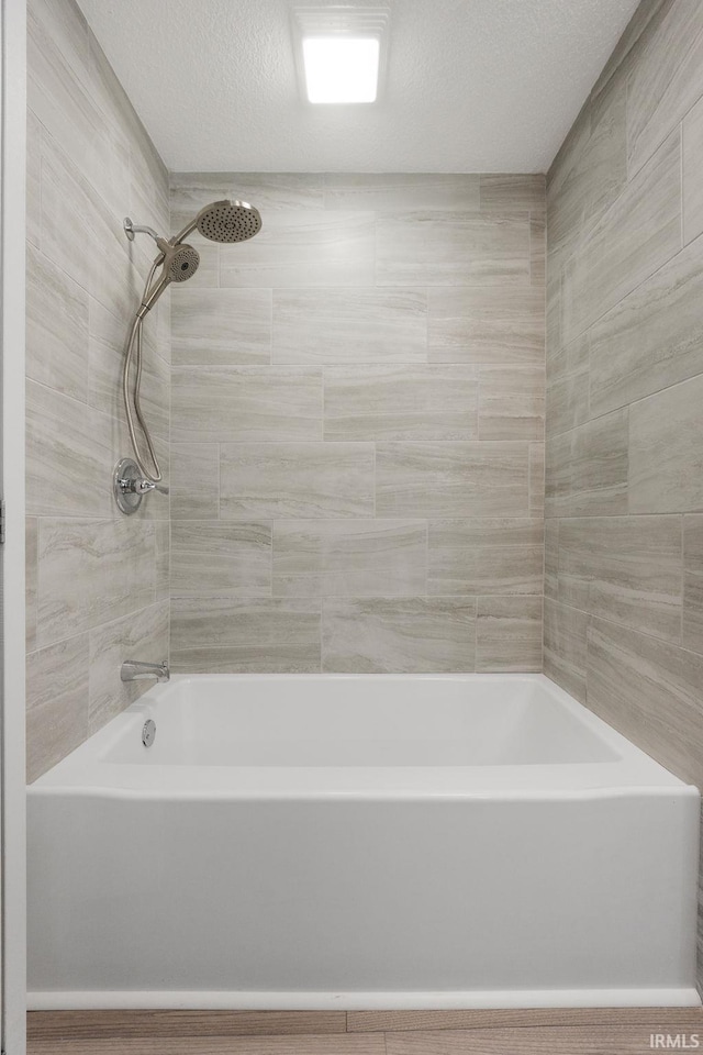 bathroom featuring a textured ceiling