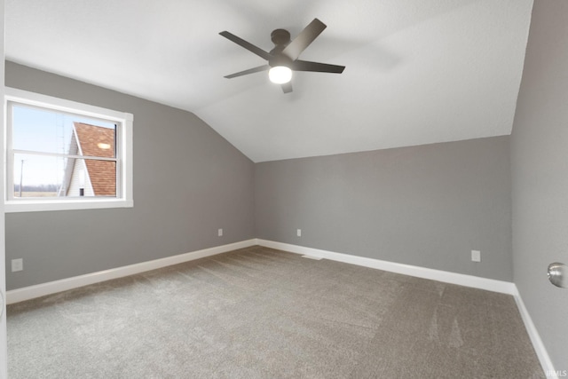 3598 W Huntington Ave 57th Ave, Columbia City, IN 46725 - additional living space featuring lofted ceiling, a ceiling fan, baseboards, and carpet