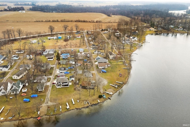 aerial view with a water view and a rural view