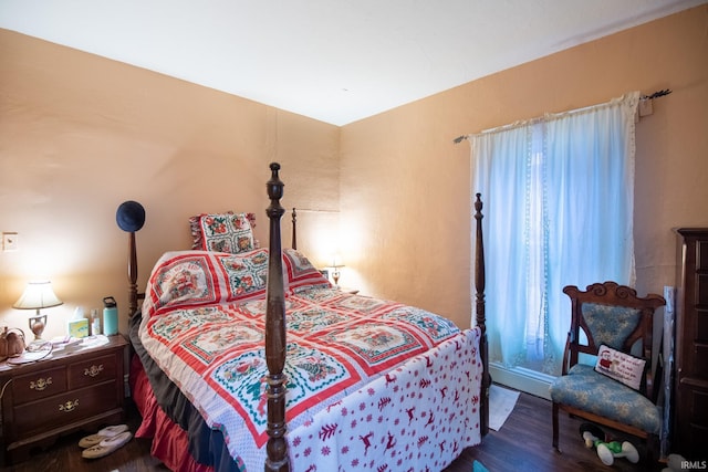 bedroom featuring hardwood / wood-style floors