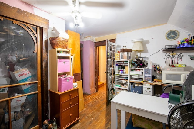 office with ceiling fan, wood-type flooring, and vaulted ceiling