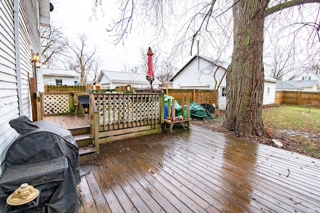 wooden terrace with grilling area