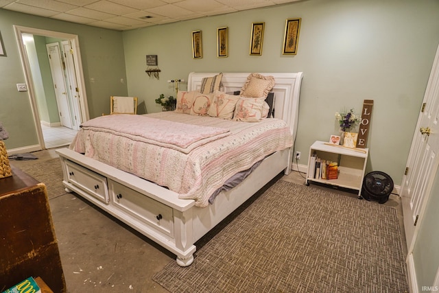 bedroom featuring a drop ceiling