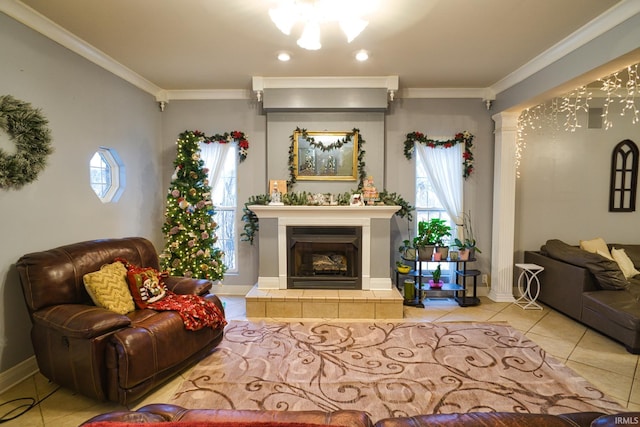 tiled living room with a tiled fireplace, a wealth of natural light, and ornamental molding