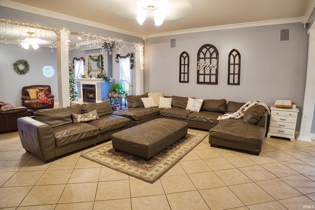 living room featuring crown molding and light tile patterned floors