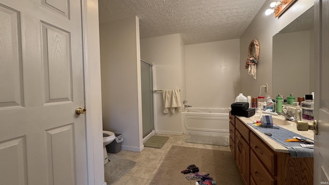 full bathroom featuring vanity, tile patterned floors, a textured ceiling, and plus walk in shower