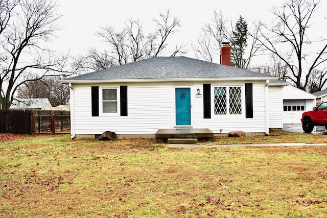 view of front of home with a front lawn