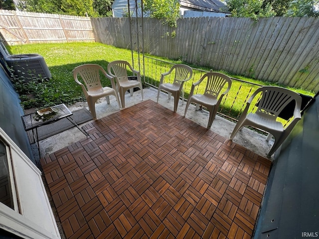 view of patio featuring central AC unit