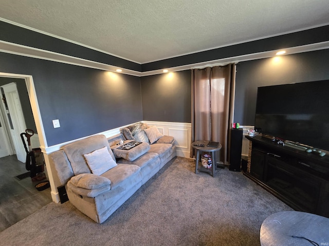 living room featuring carpet floors and a textured ceiling