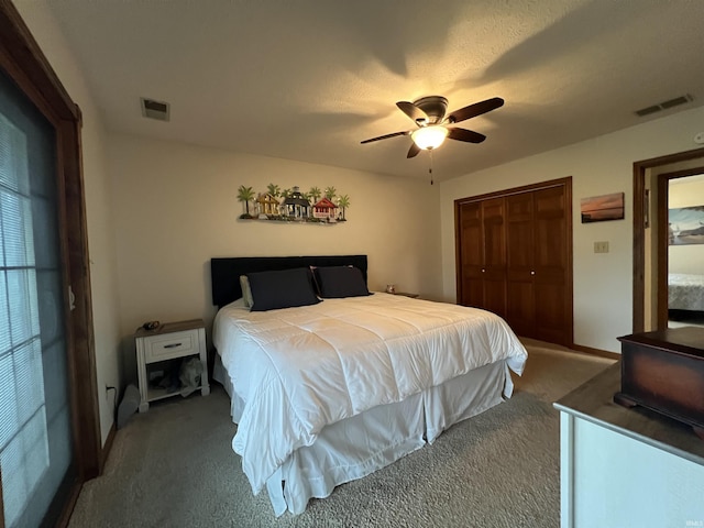 bedroom featuring carpet, ceiling fan, and a closet