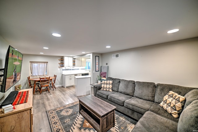 living room with light wood-type flooring