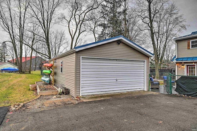 garage with a lawn