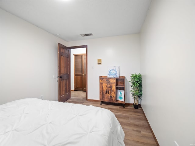 bedroom featuring light wood-type flooring