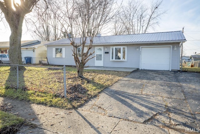 single story home featuring a garage