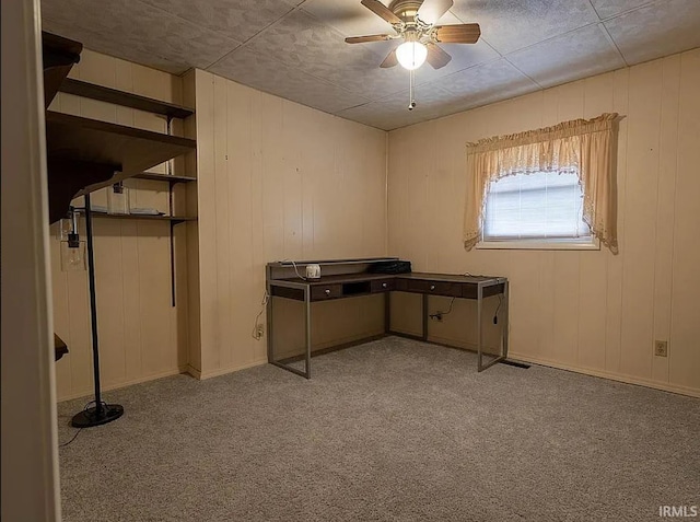 interior space featuring ceiling fan and light carpet