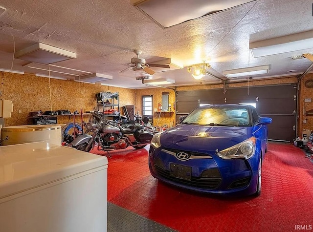 garage with ceiling fan and refrigerator