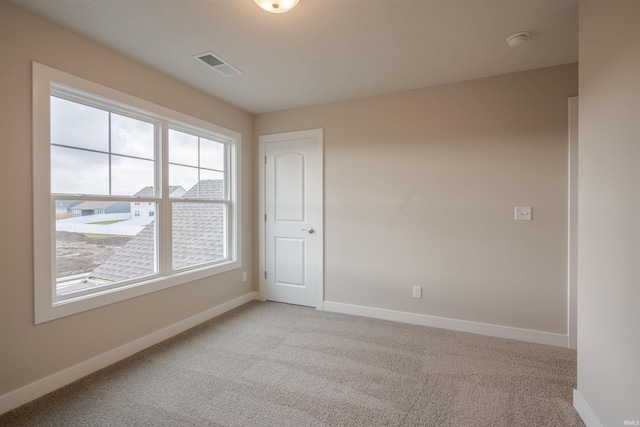 empty room with light carpet