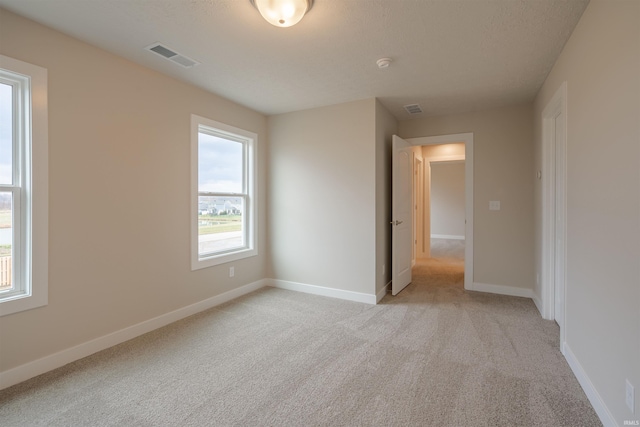 empty room with light carpet