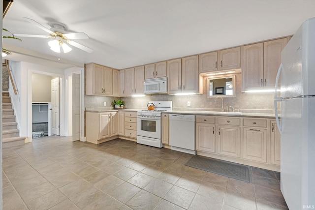 kitchen with ceiling fan, sink, white appliances, and light brown cabinets