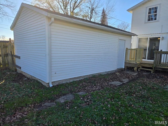 view of side of property featuring an outdoor structure