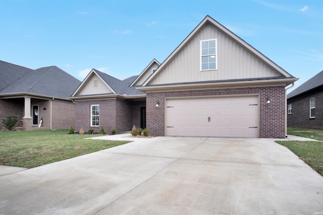 view of front of house featuring a garage and a front lawn