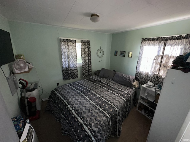 bedroom featuring carpet