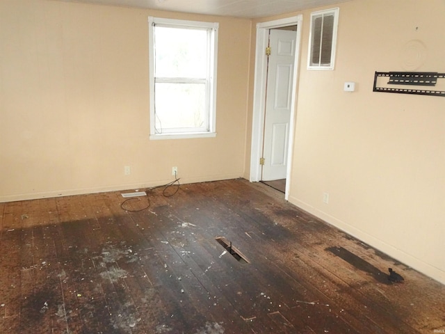 unfurnished room featuring wood-type flooring