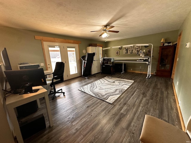 office space featuring ceiling fan, dark hardwood / wood-style flooring, and a textured ceiling