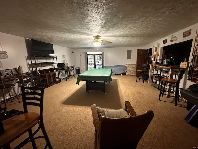 game room featuring ceiling fan, carpet floors, a textured ceiling, and pool table