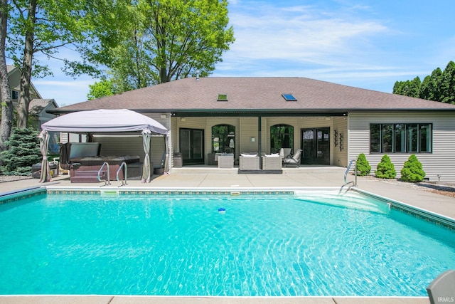 view of pool with a patio and an outdoor hangout area