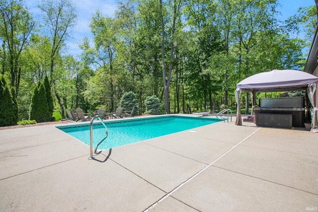 view of pool with a gazebo and a patio area