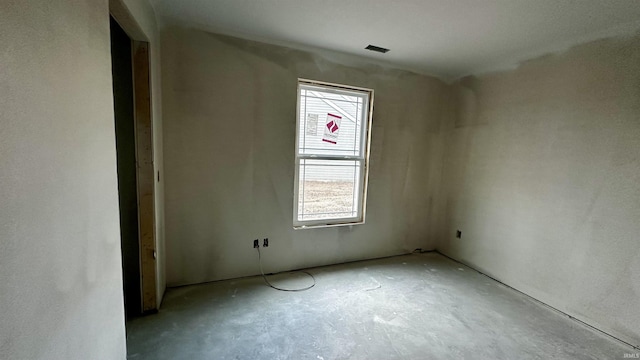 empty room with concrete floors