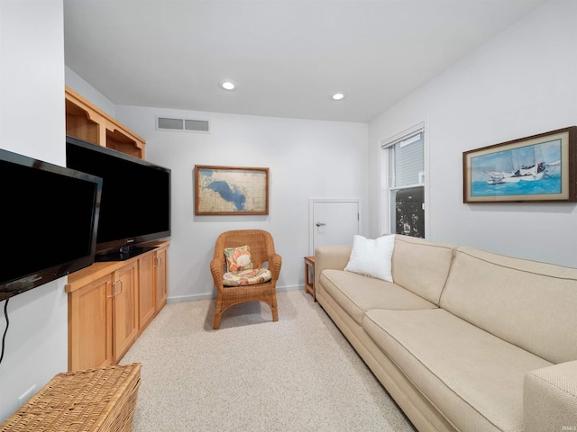 living room featuring light carpet