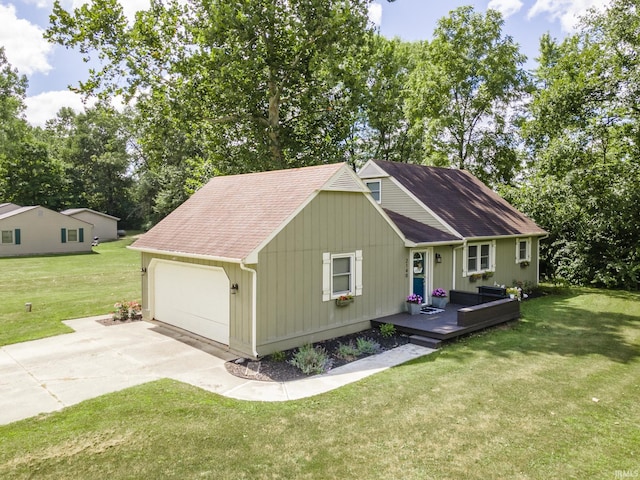 view of front of home featuring a garage and a front yard